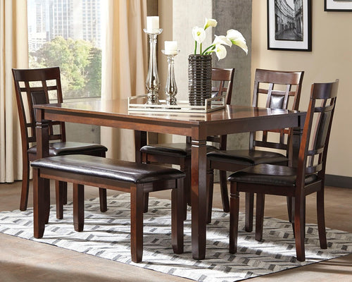Brown dining table set with rectangular table and dark leather-look benches and chairs