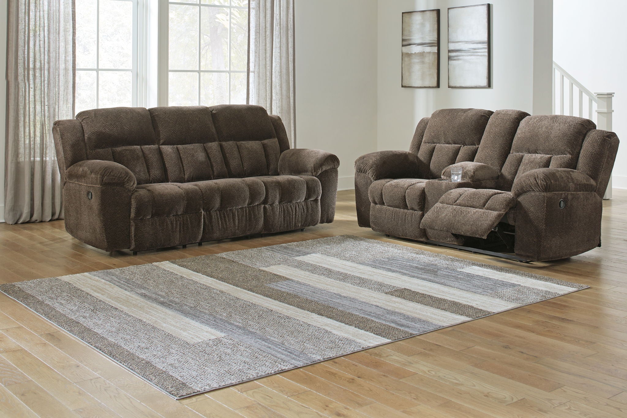 Reclining living room set with brown recliner sofa and matching recliner loveseat