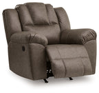 Dark brown rocker recliner chair shown reclined with extended footrest