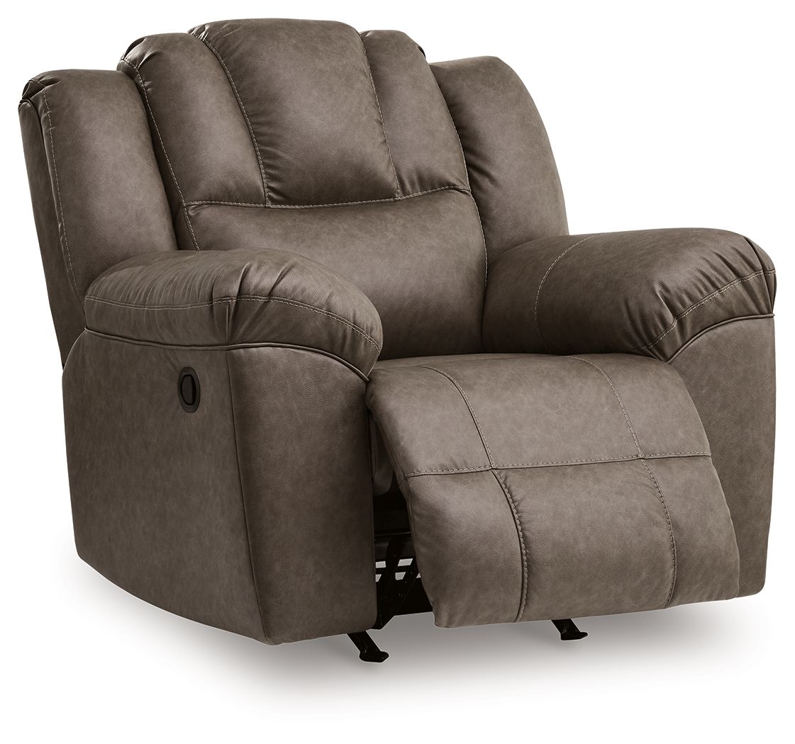 Dark brown rocker recliner chair shown reclined with extended footrest