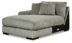 Corner chaise with ribbed fog-gray upholstery, built-in arm and supportive seat cushion