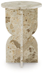 Beige stone-look accent table with round top and hourglass pedestal base, side view