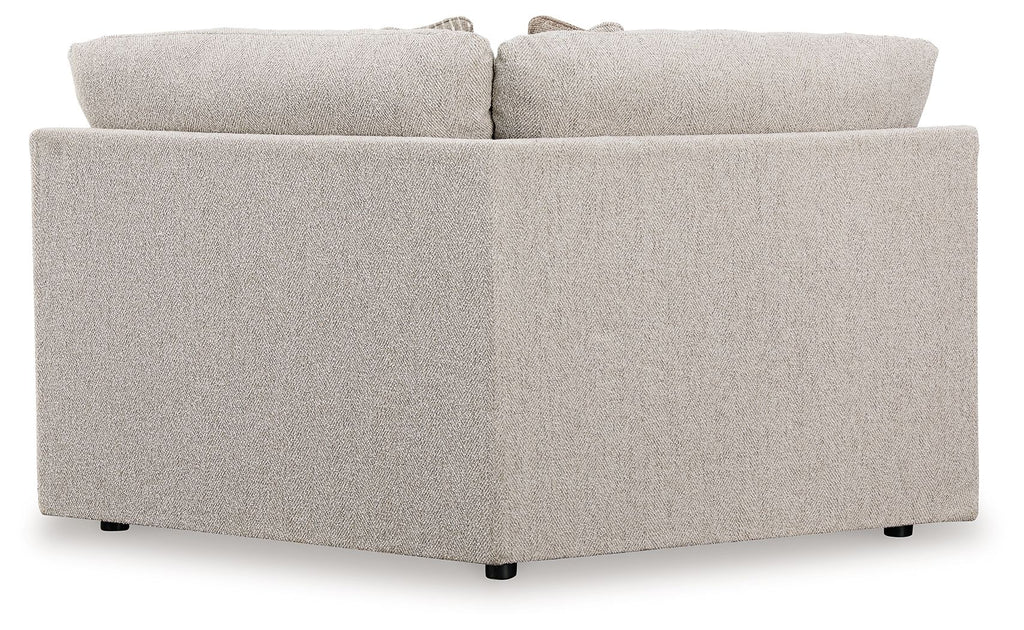 Wedge sectional sofa in light gray fabric, corner profile with padded armrests