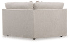 Wedge sectional sofa in light gray fabric, corner profile with padded armrests