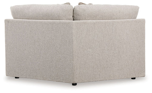 Wedge sectional sofa in light gray fabric, corner profile with padded armrests
