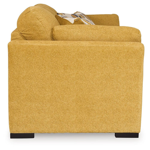 Sunflower sofa sleeper side view with rolled arm and open back cushion