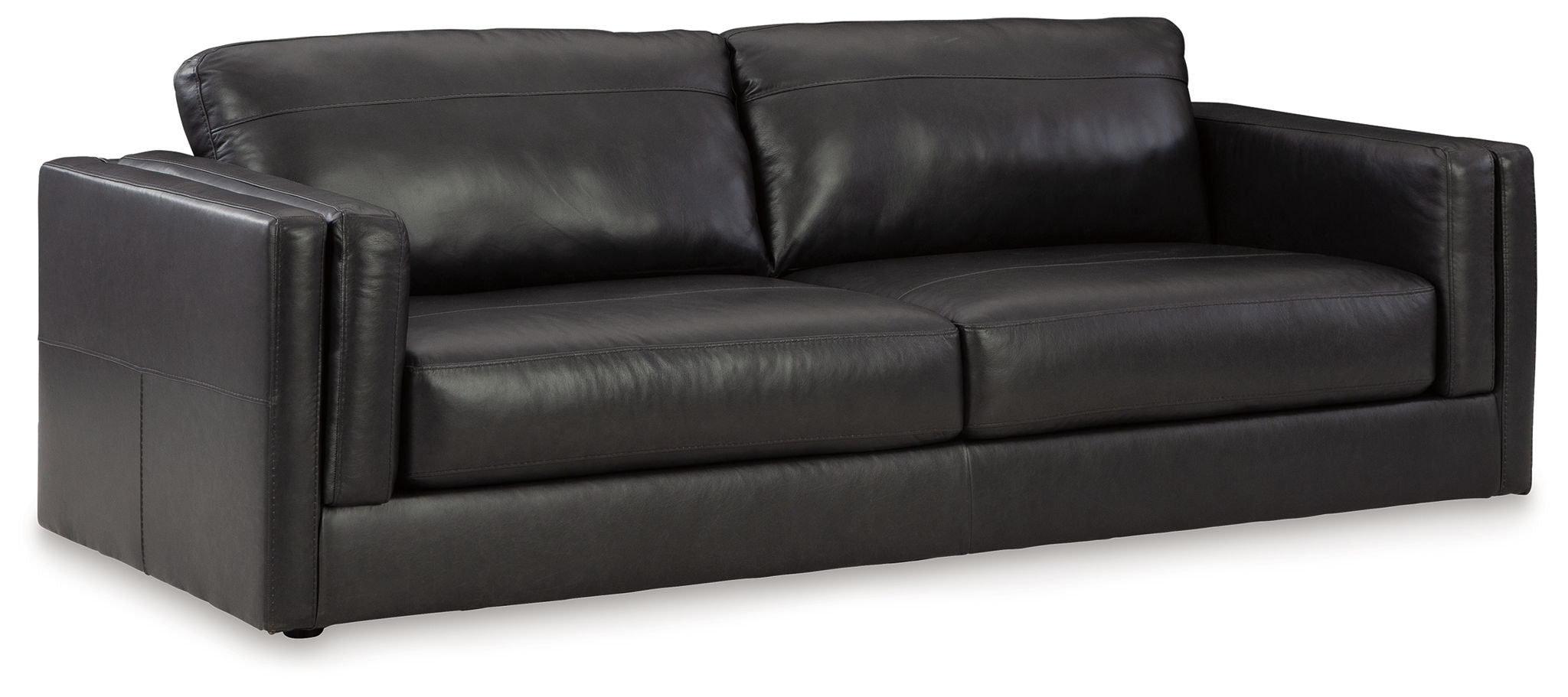 Black leather sofa with box cushions and rolled backrest