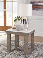 Square end table with white top, distressed brown legs, and lower storage shelf