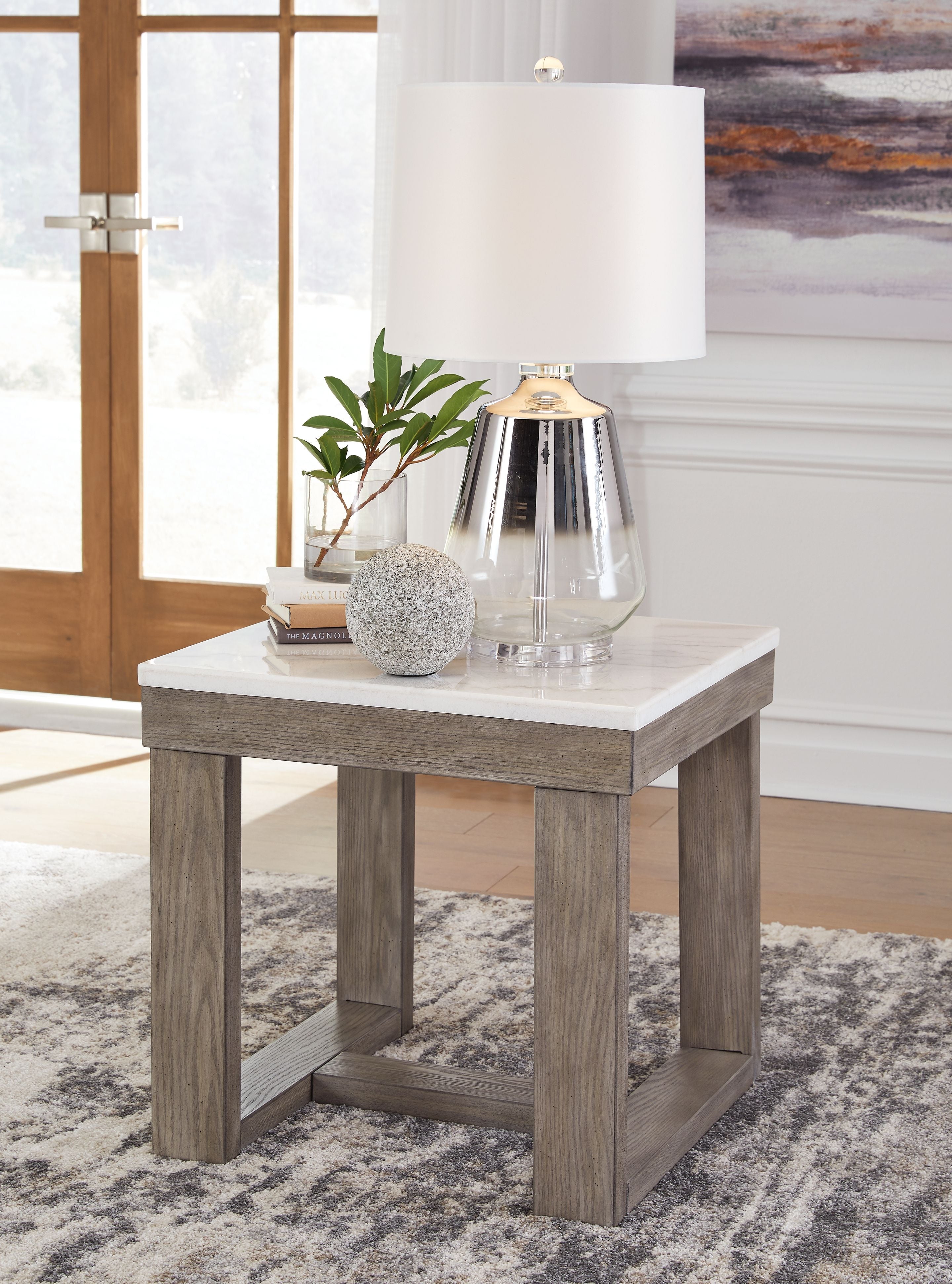 Square end table with white top, distressed brown legs, and lower storage shelf