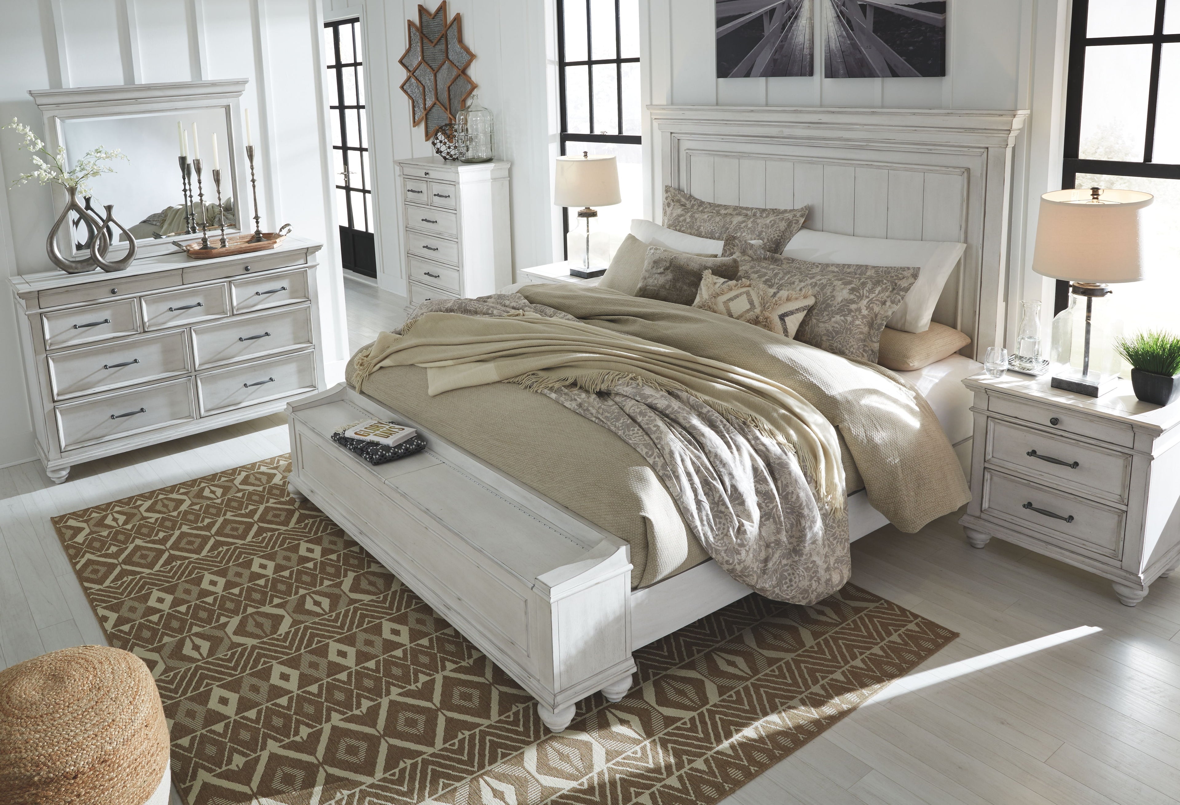 Panel bedroom set bedroom scene: white bed frame with panel headboard and matching storage