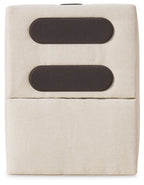 Oyster upholstered console with audio system; two dark oval speaker grilles