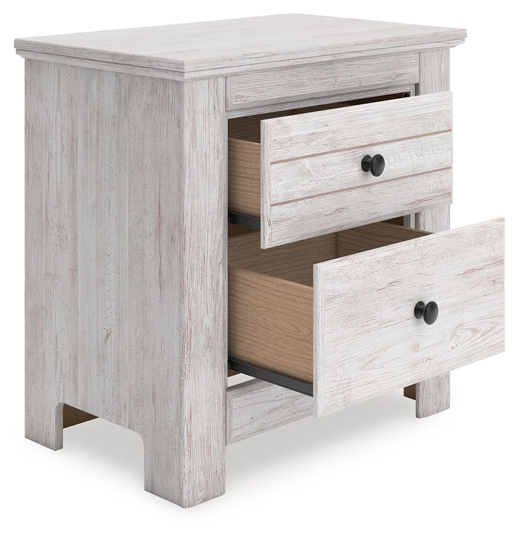 White two-drawer night stand with both drawers open and black round knob pulls