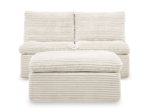 Ivory upholstered armless chair cushions and ottoman, ribbed texture with rounded front seat