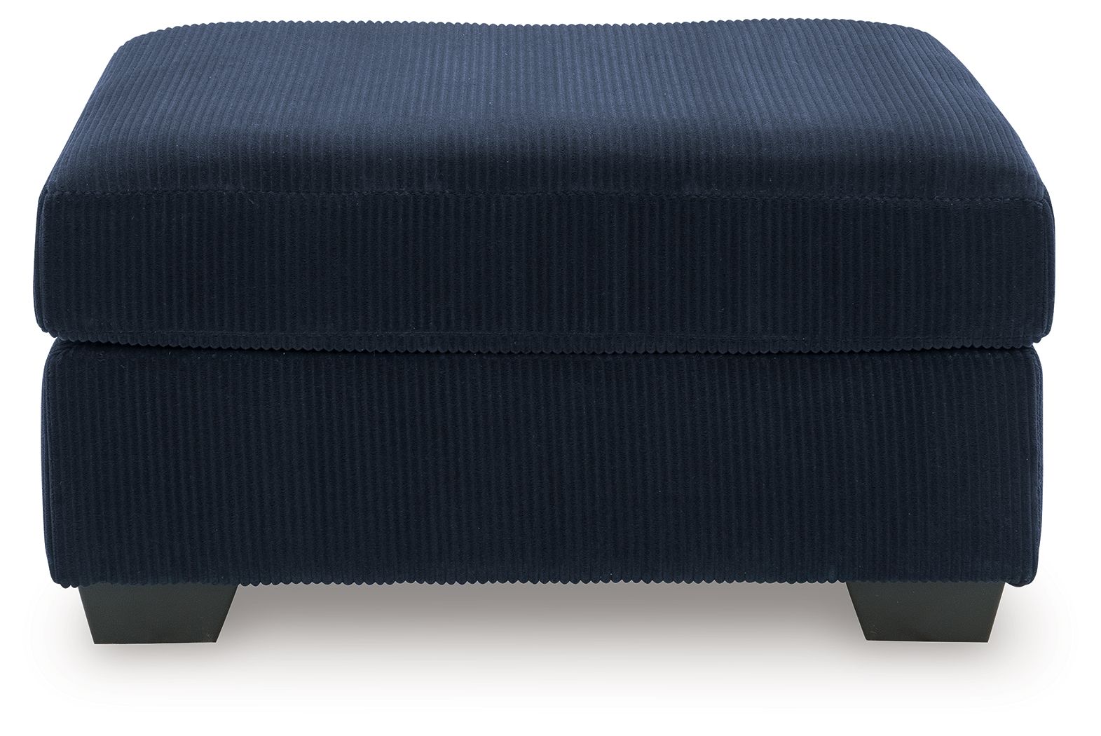 Blue ottoman with ribbed fabric, rounded padded top, dark legs.
