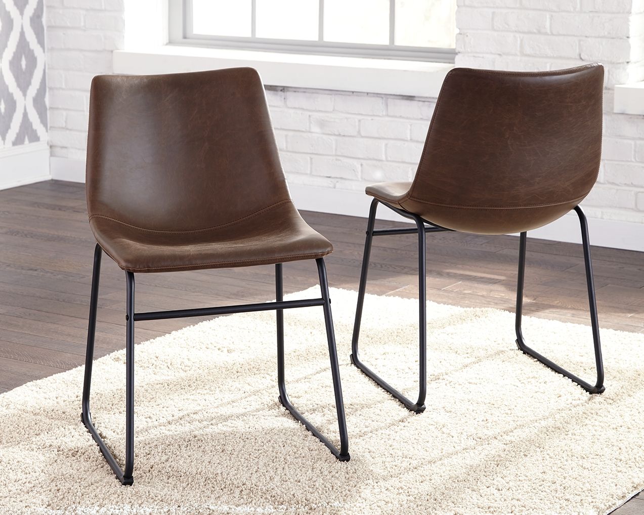 Brown upholstered side chair with dark metal frame