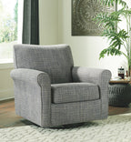 Swivel accent chair in dark gray textured fabric with padded arms and seat