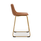 Upholstered barstool with light brown seat, gold-tone U-shaped base and footrest