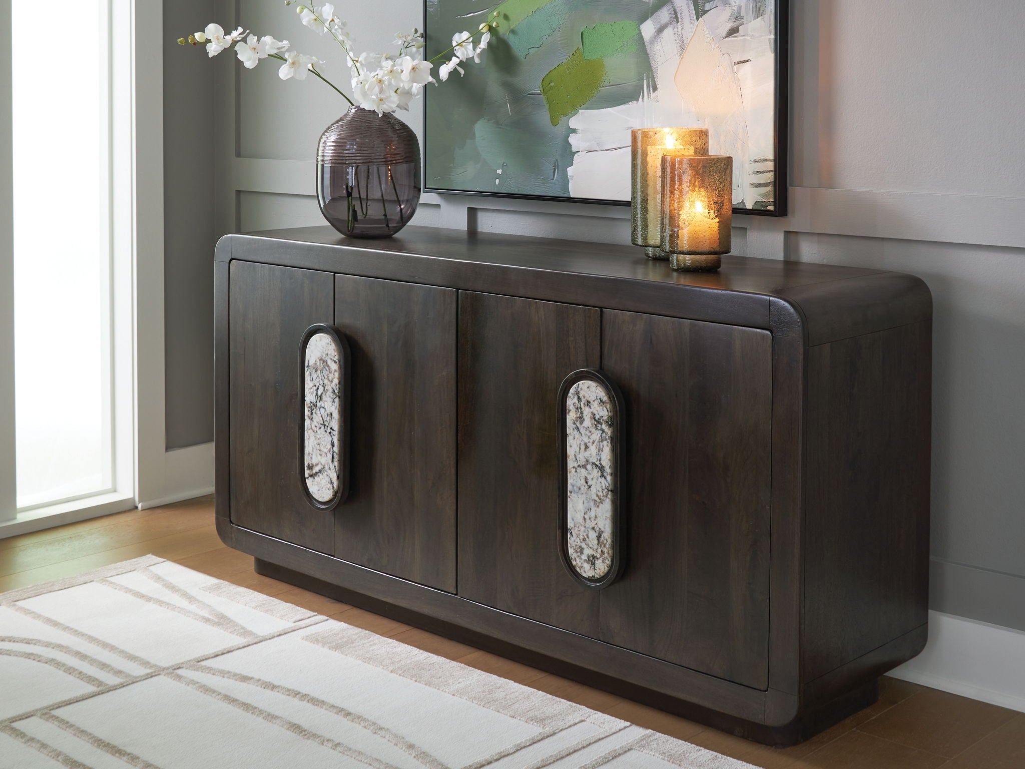 Espresso brown accent cabinet with two oval glass door panels