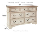 Two-tone dresser with six drawers and dark metal cup handles, front corner view.