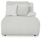 Light gray striped upholstered chaise lounge with three back cushions and track arms