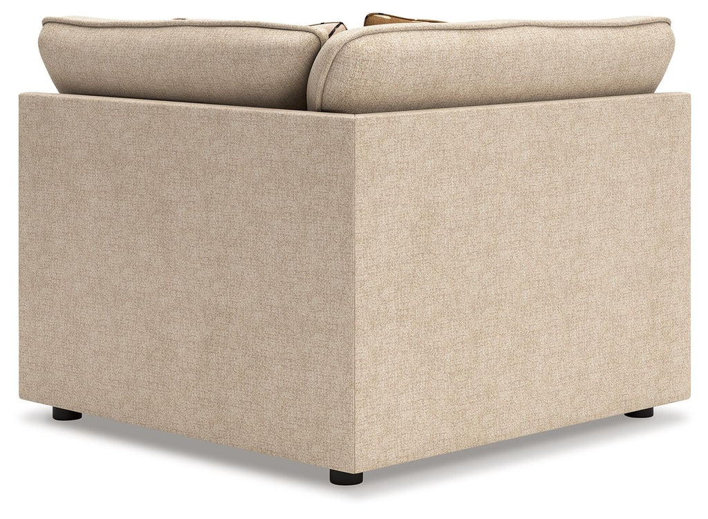 Beige fabric wedge chair with rolled arm and tapered legs