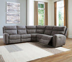 Dark gray power reclining sectional sofa with corner chaise and padded recliner arms