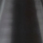Black metal lamp shade close-up with smooth brushed finish