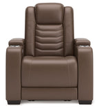 Brown power recliner chair with cushioned upright back and padded headrest