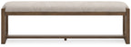 Upholstered dining bench with oatmeal seat and light brown frame, front view