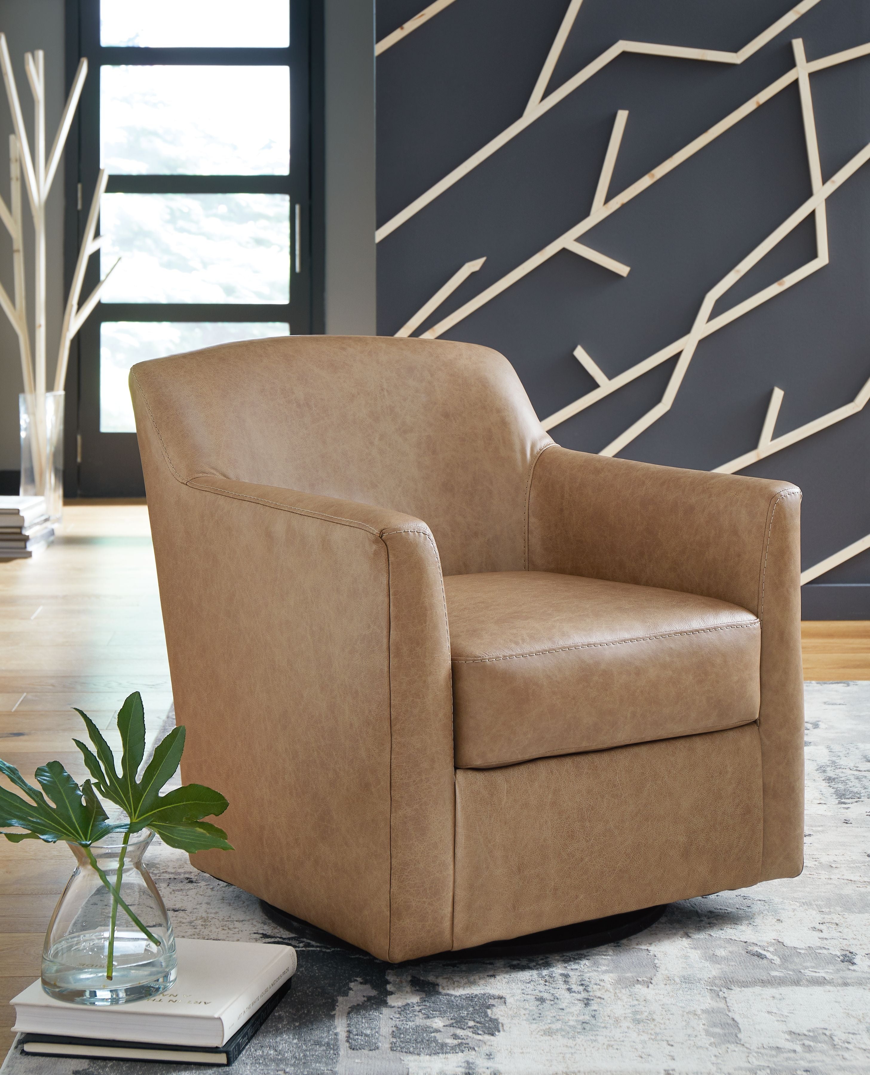 Beige swivel accent chair with sloped arms, cushioned seat, and rounded back