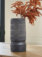 Beninworth vase, black ribbed cylinder with rounded pedestal base.