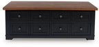 Black lift-top cocktail table with brown top and eight drawer compartments