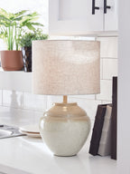 Cream beige table lamp with drum fabric shade and textured speckled ceramic body