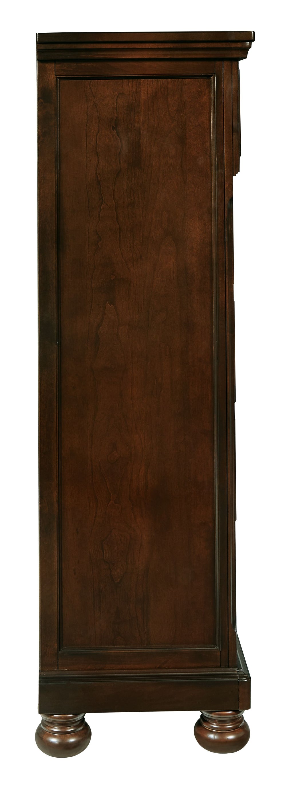 Rustic brown chest of drawers side view with turned feet and panel detailing