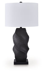 Black poly table lamp with white drum shade and textured sculpted base