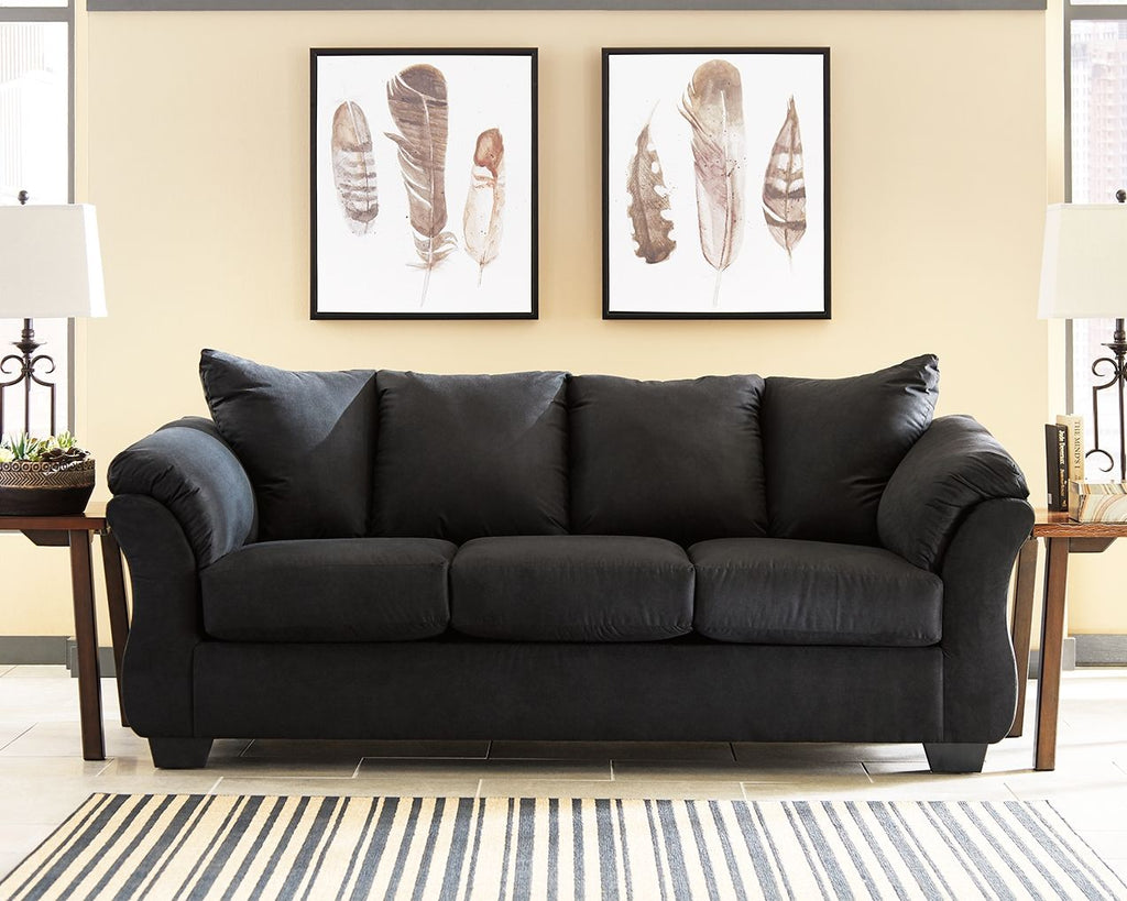 Black sofa with three seat cushions and padded rolled arms, centered view