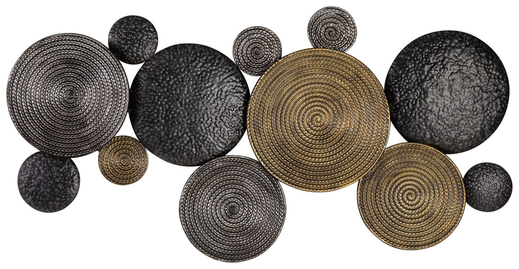 Metallic circular wall decor discs in black, gray, and bronze tones.