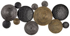 Metallic circular wall decor discs in black, gray, and bronze tones.