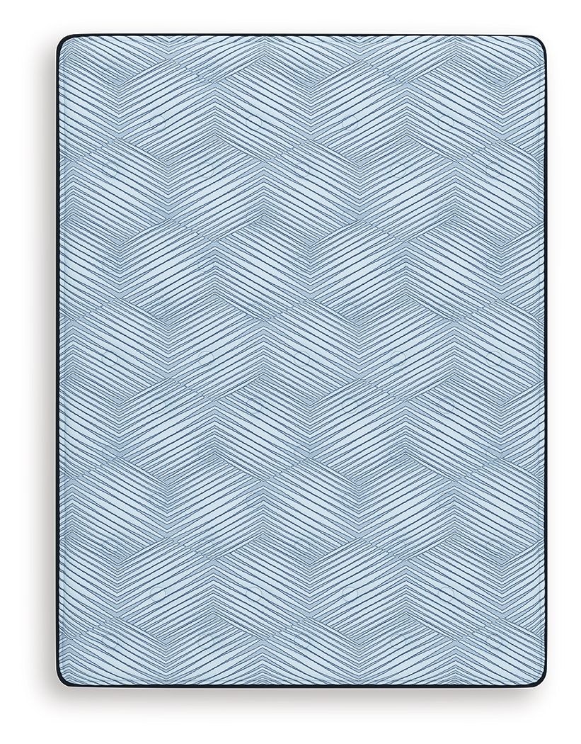 Blue mattress top with geometric pattern and rounded corners