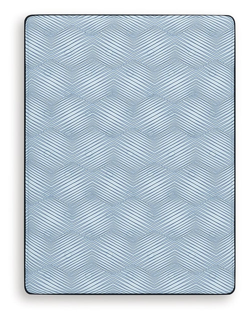 Blue mattress top with geometric pattern and rounded corners