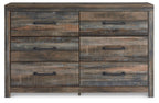 Rustic wood dresser front view with six drawers and black bar pulls in weathered gray-brown