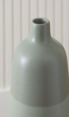 Sage green ceramic vase with wide round belly and short opening