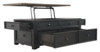 Dark gray lift-top cocktail table with open top, showing storage compartments and drawers.