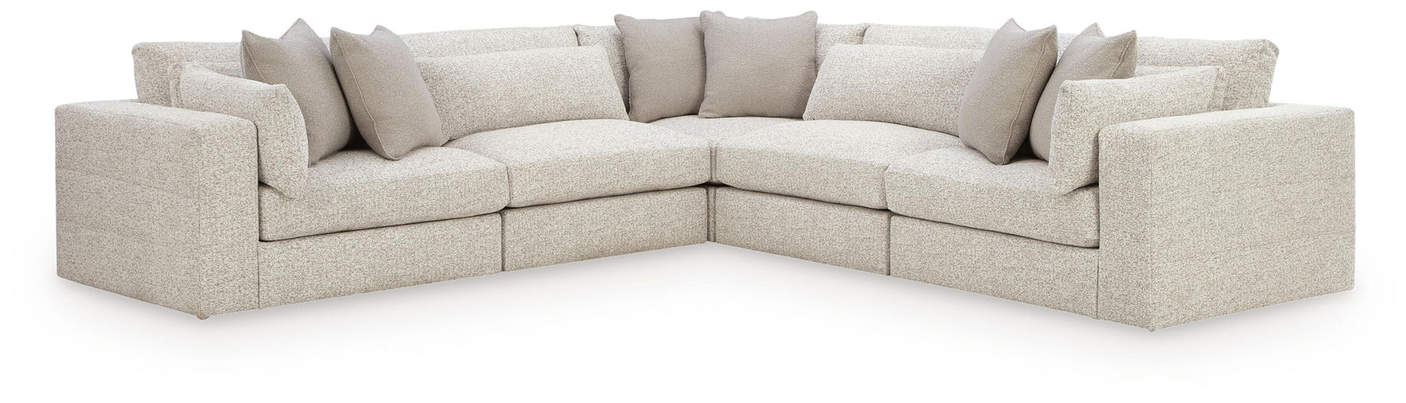 Beige U-shaped sectional sofa with corner and chaise lounge, padded arms and throw pillows
