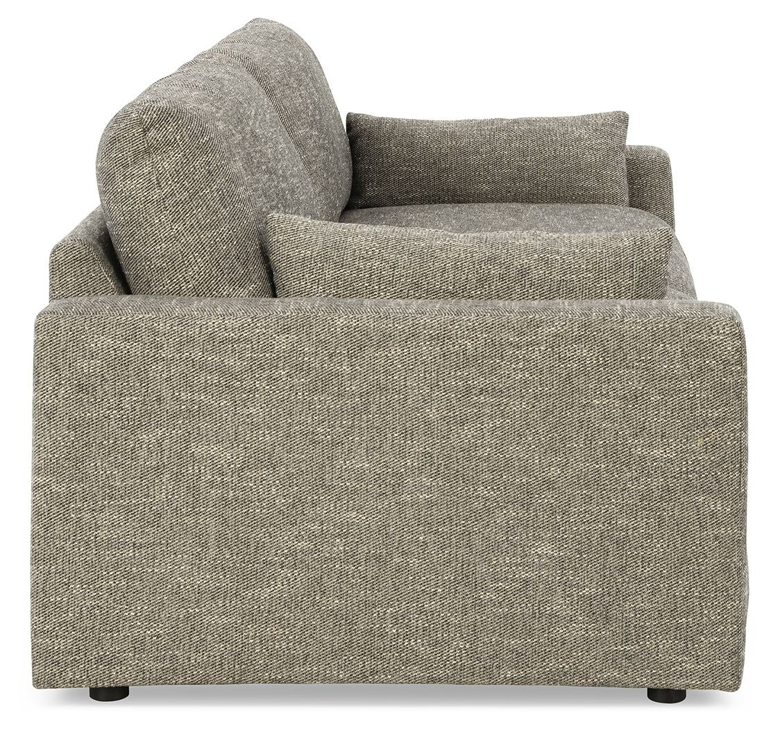 Gray textured upholstered loveseat with rounded arms and two back pillows