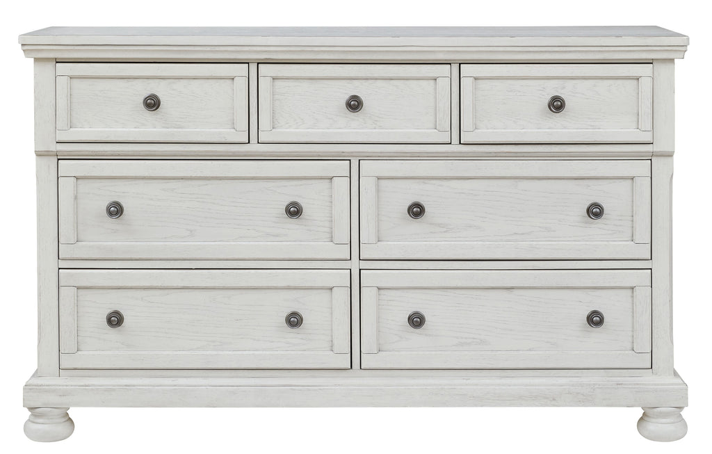 Antique white dresser with six drawers and round knob pulls, three top and three bottom.