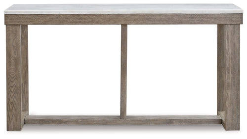 Sofa table with ivory top and brown wood frame, open shelf under tabletop
