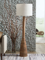 Wood floor lamp with tall natural brown wooden base and white fabric shade