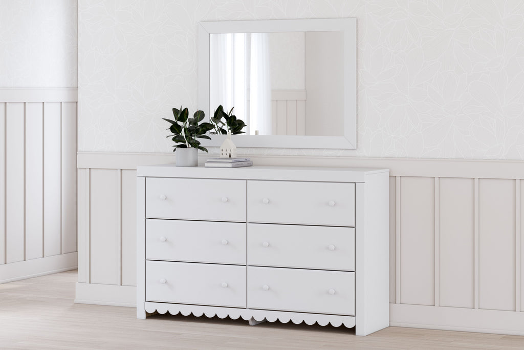 White dresser with mirror, six drawers with round knobs, scalloped apron