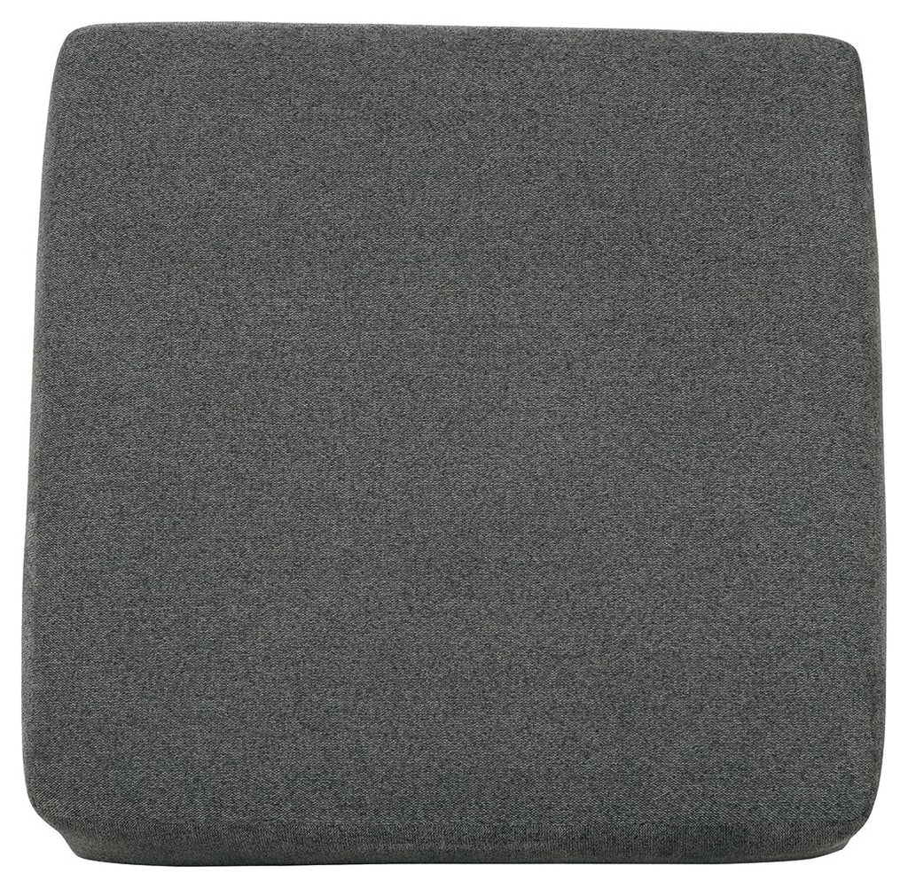 Oversized accent ottoman in dark gray fabric with rounded top and short legs